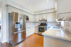 Stainless Steel Refrigerator in a Luxurious Kitchen