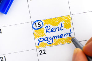 Marking the Calendar with a Reminder to Pay the Rent
