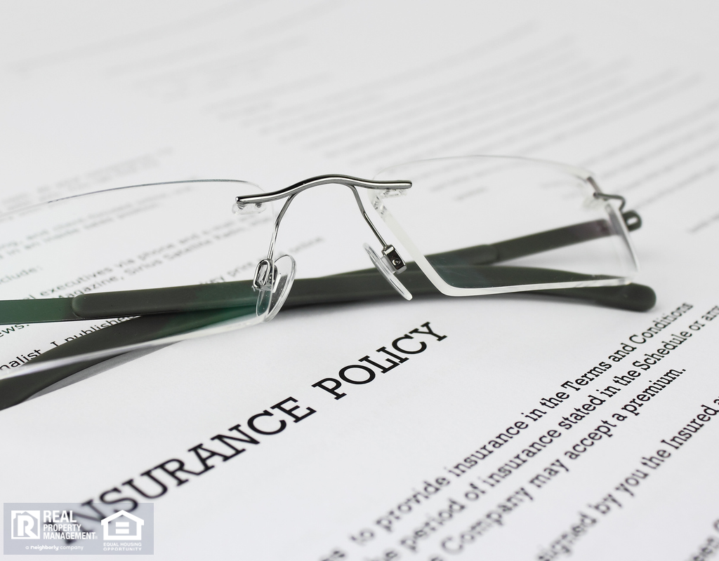 Maitland Renter's Insurance Policy with Glasses Propped on Top