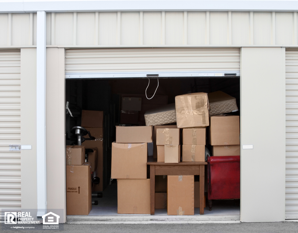 A Storage Unit Filled Completely with Boxes and Furniture