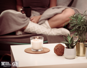 Candle Sitting on the End Table in a Living Room