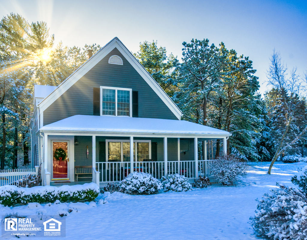 Cozy Home Covered in Snow on Sunny Winter Day