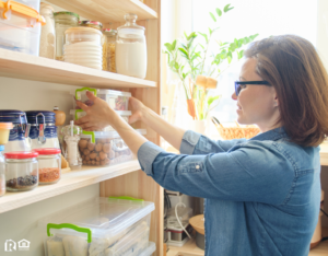 Johnston Tenant Organizing the Pantry in Their Kitchen