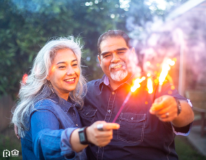 Lexington Park Couple Holding Sparklers Together