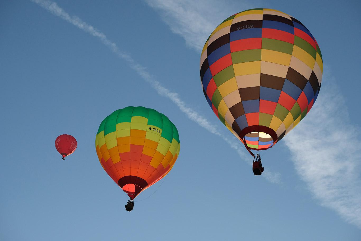 Three hot air balloons