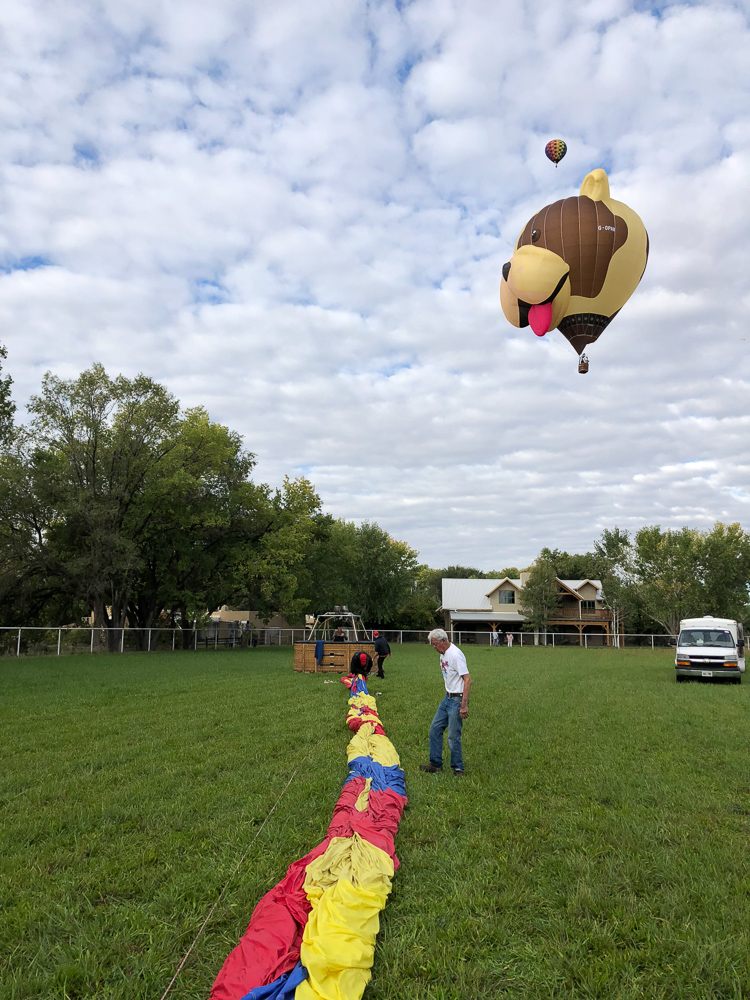 Packing a hot air balloon that has landed