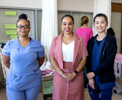 people standing in a cna classroom