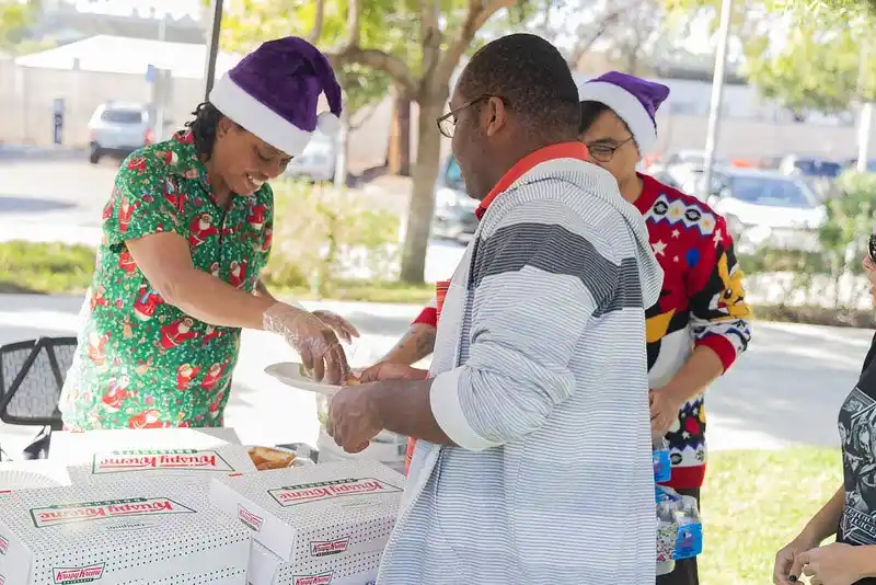 a buffet table with donuts