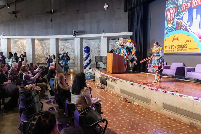 an audience and a performance on stage