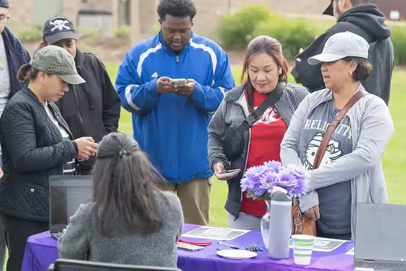 people at an event table