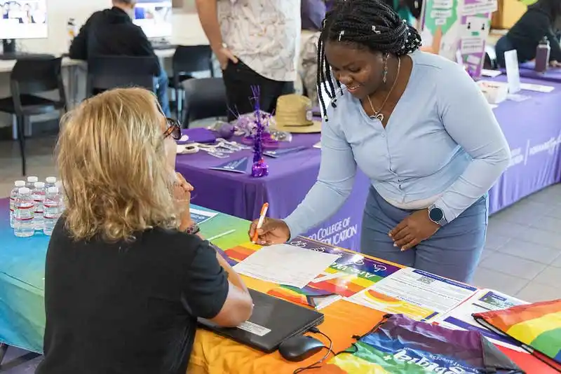 people at an event table