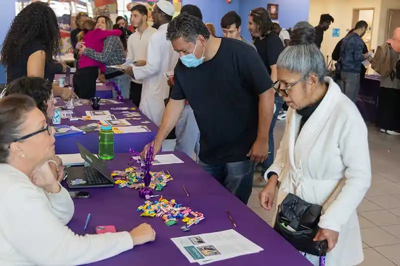 people at an event table