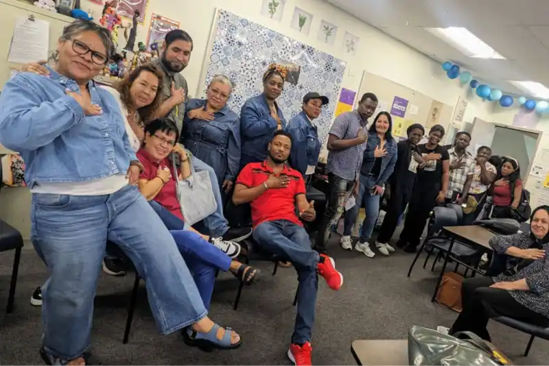 a group of people wearing denim