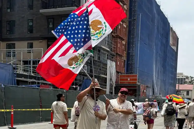 2 people waving flags