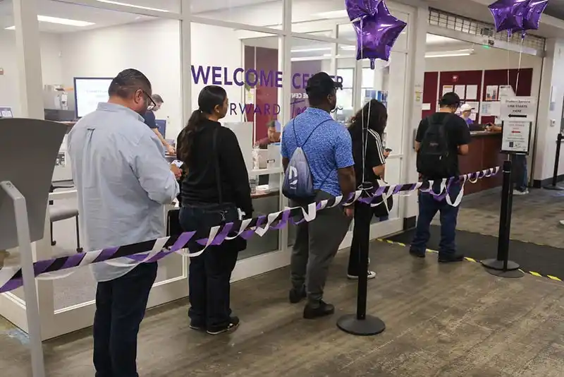 students waiting in line