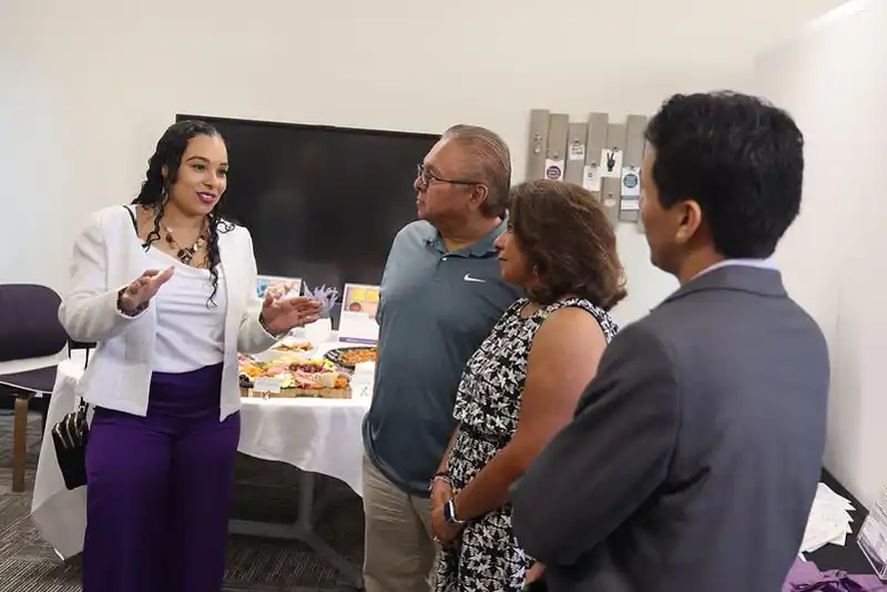 Tina King talking with participants