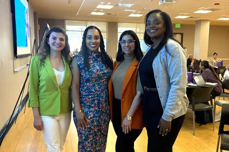 Tina King in group of event participants
