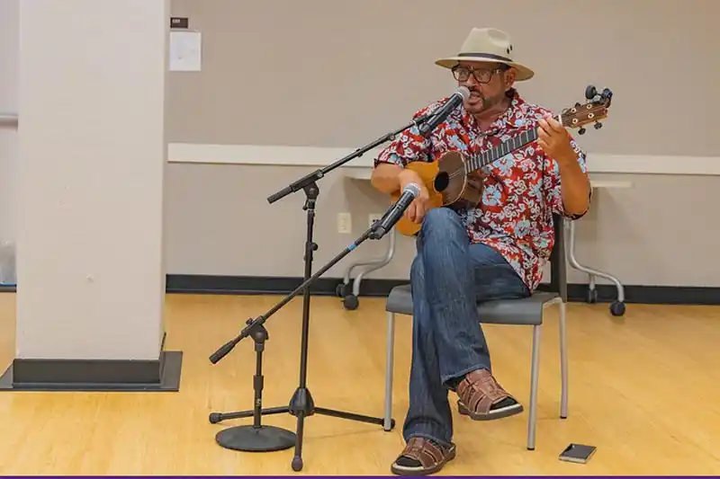man playing guitar