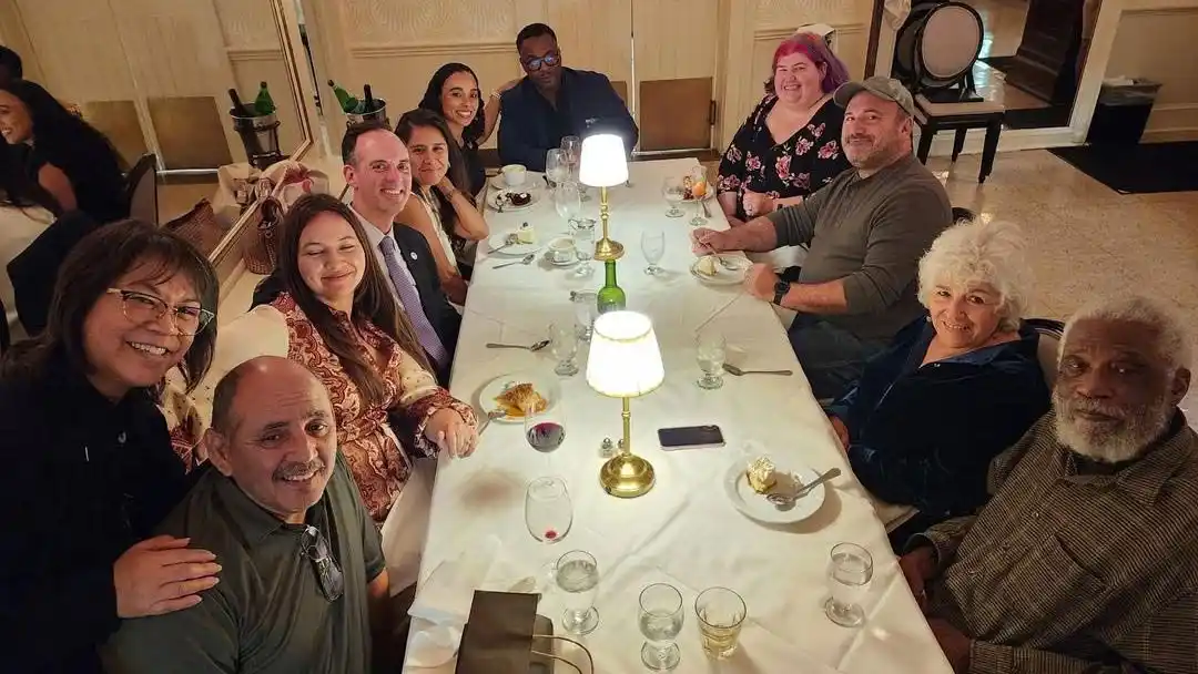 President King at dinner with Trustees and guests