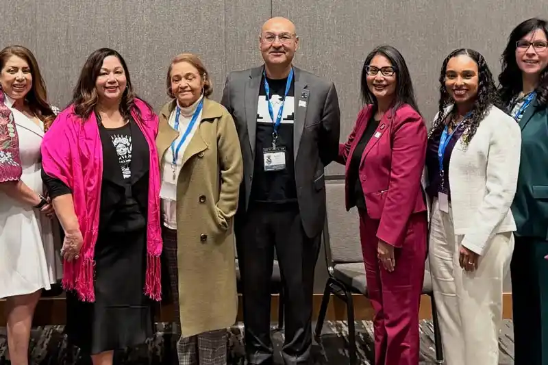 Tina King in group of participants