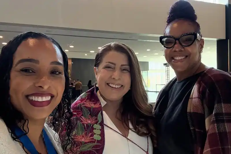 Tina King in group of participants