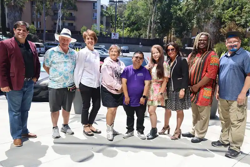 group of happy students in outside