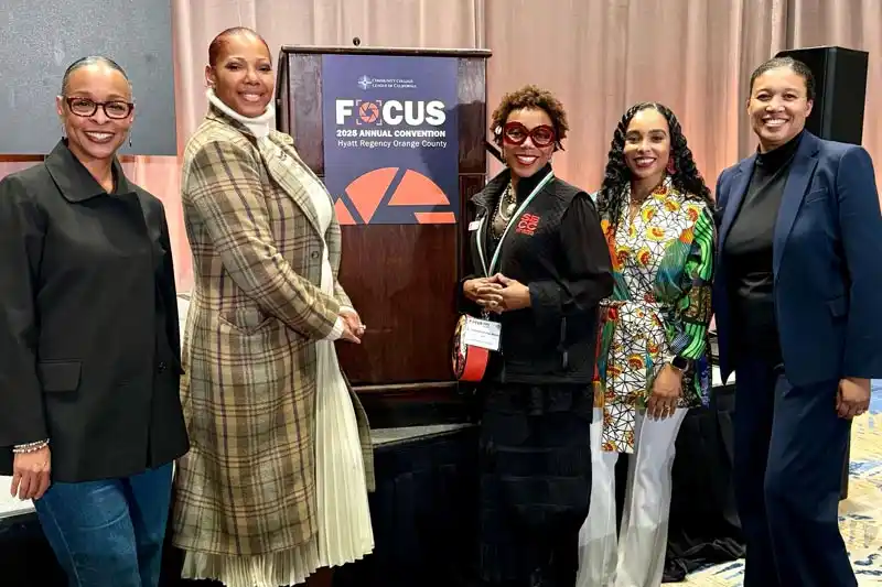 Tina King in group of participants