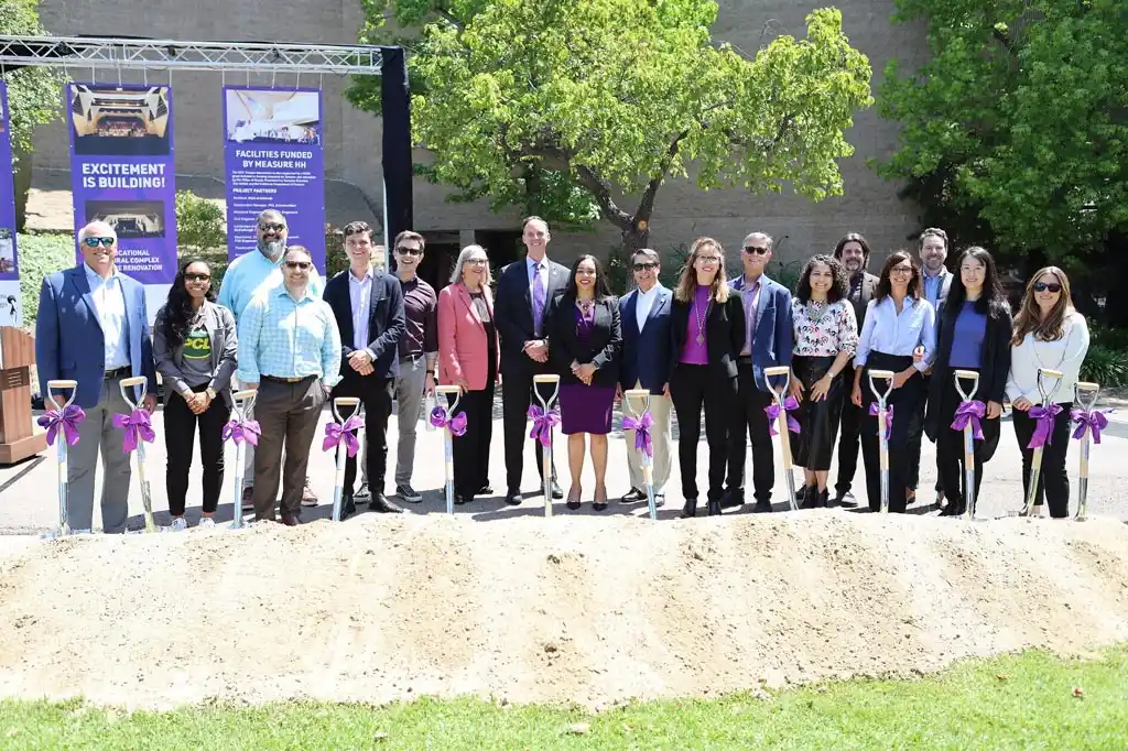 group of people with shovels