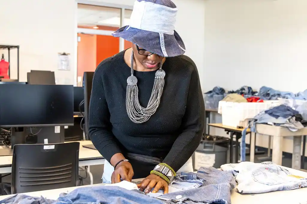 woman measuring fabric