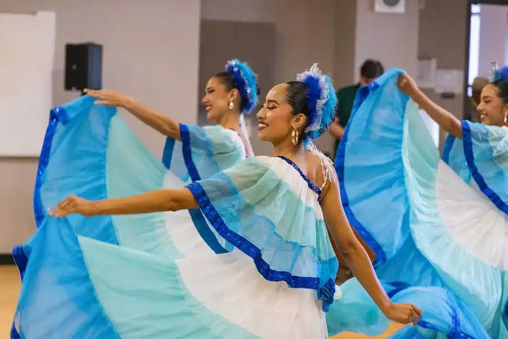 women dancing in traditional costumes