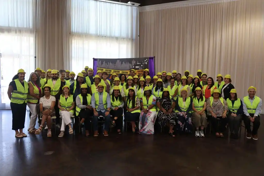 group of people with construction helmets