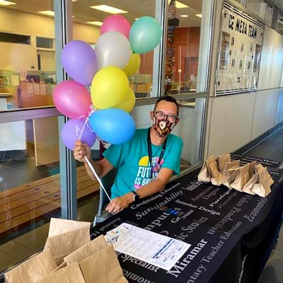 Student Services staff with balloons