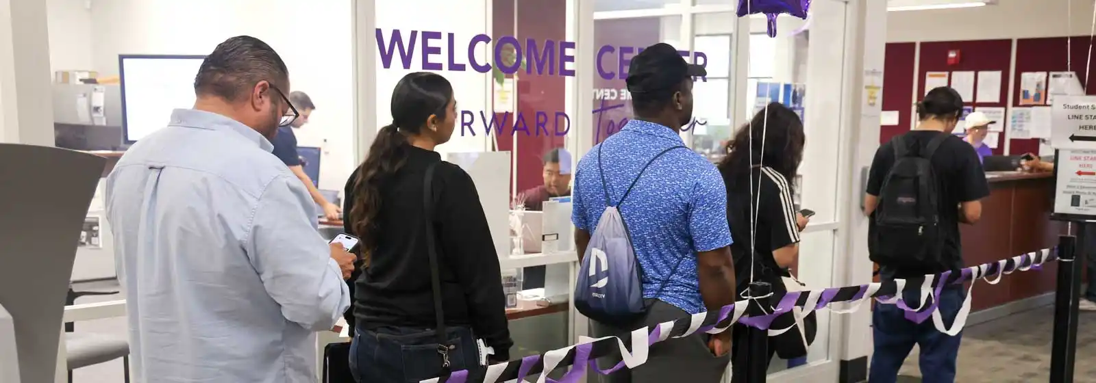 students waiting in line