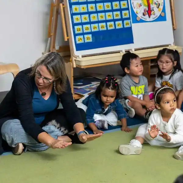 Child development teacher with students