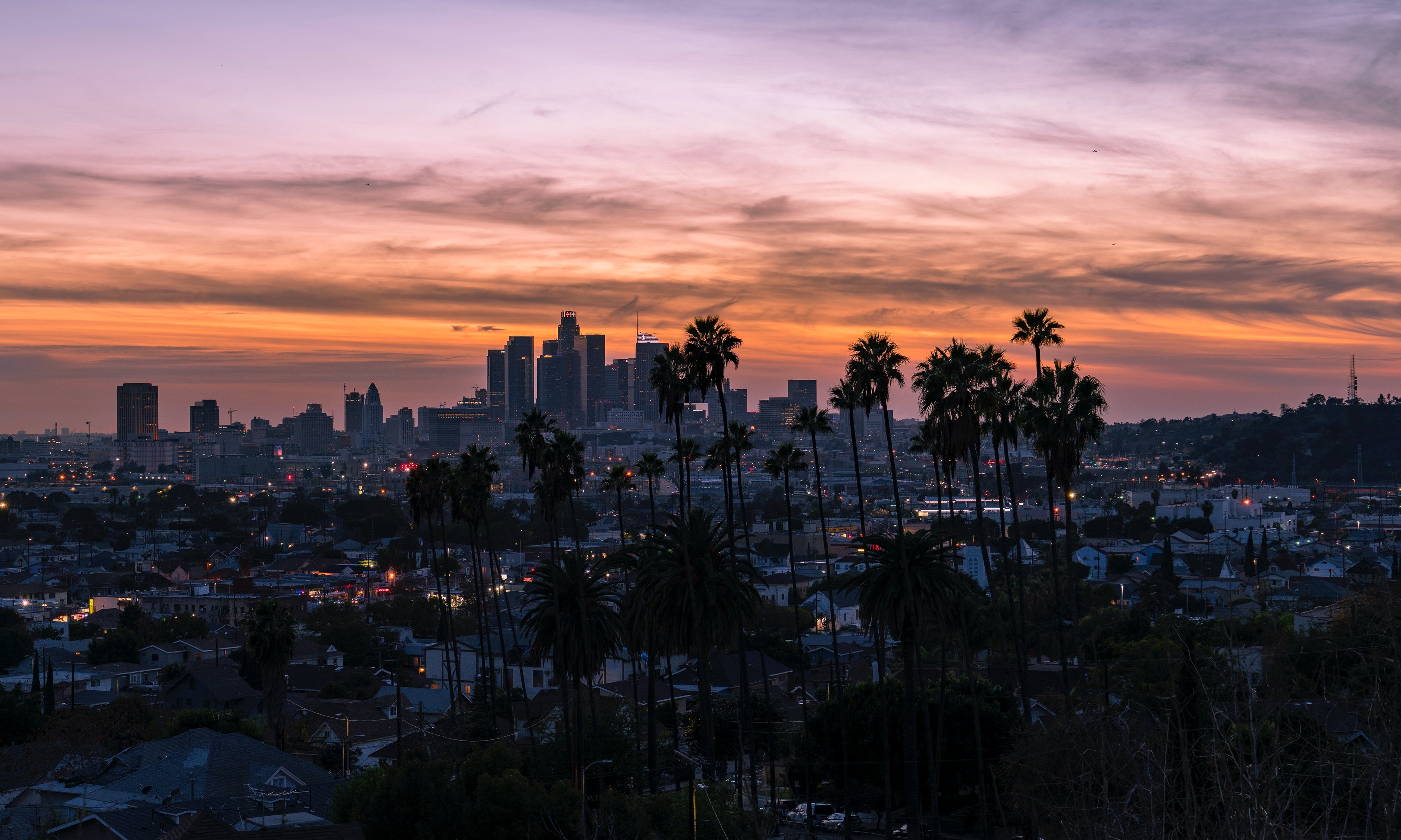 Photo of city during a sunset by Sterling Davis