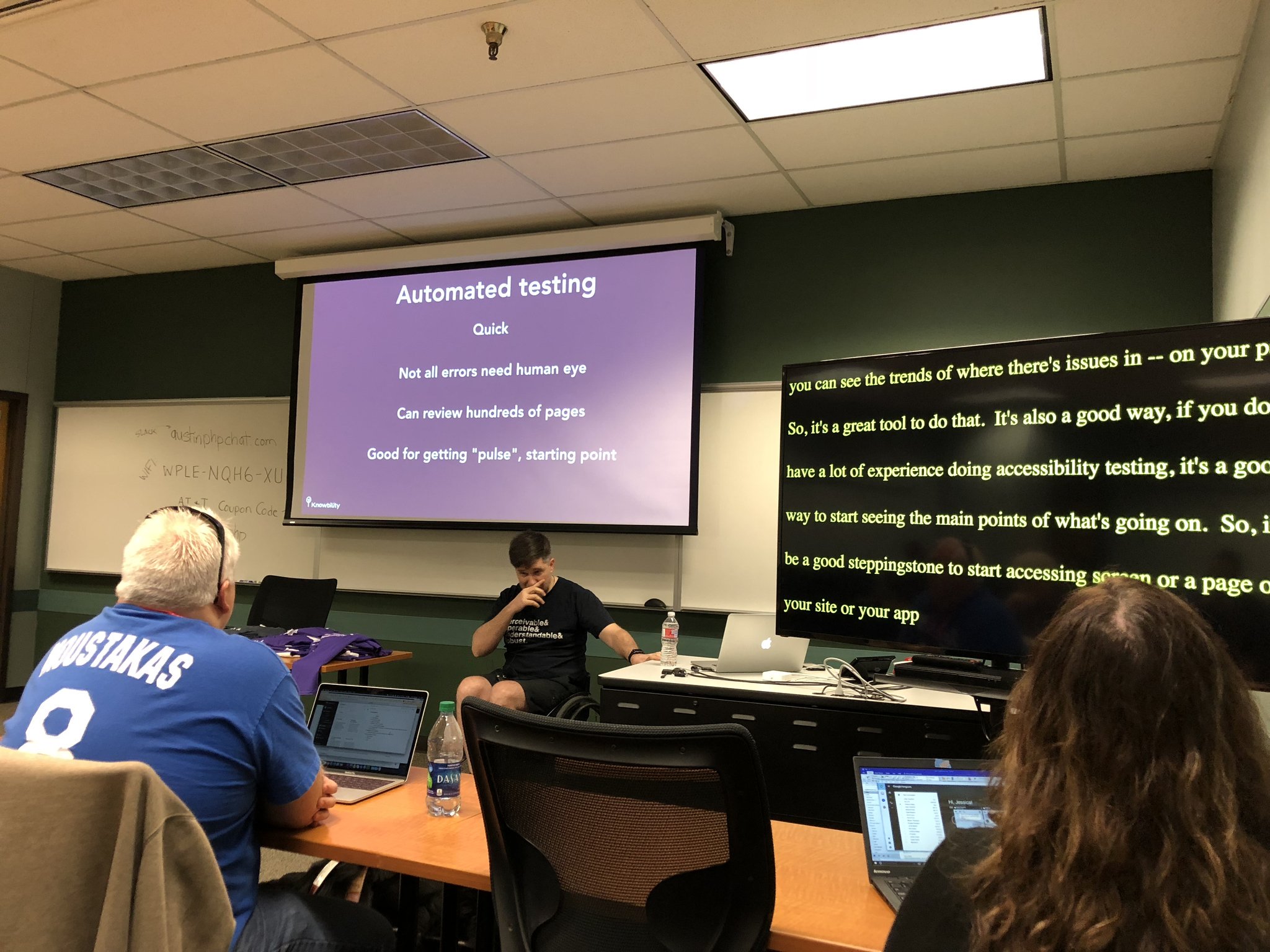 Example of live captioning. A big monitor with a captionier taking down the speaker's words in real time.
The event was Longhorn PHP.