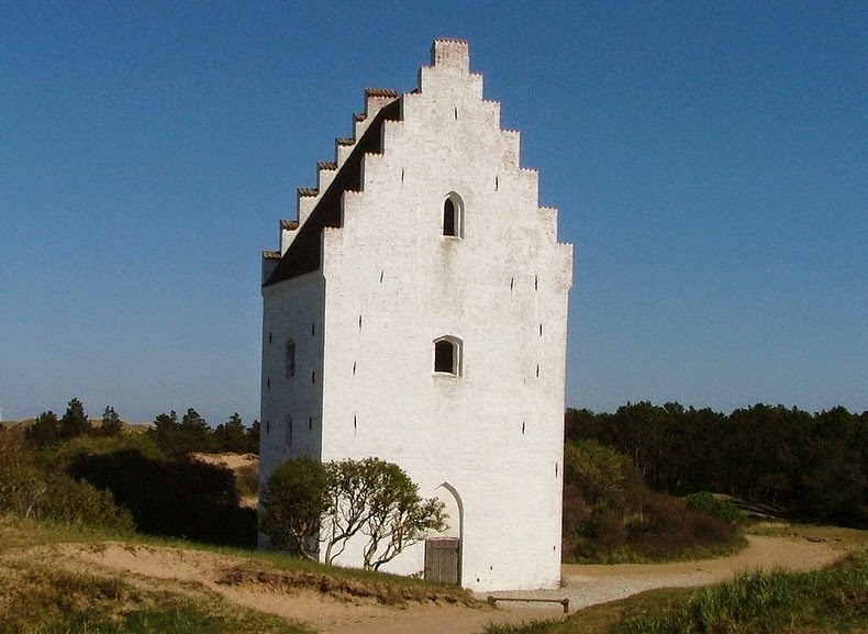The sand-covered church