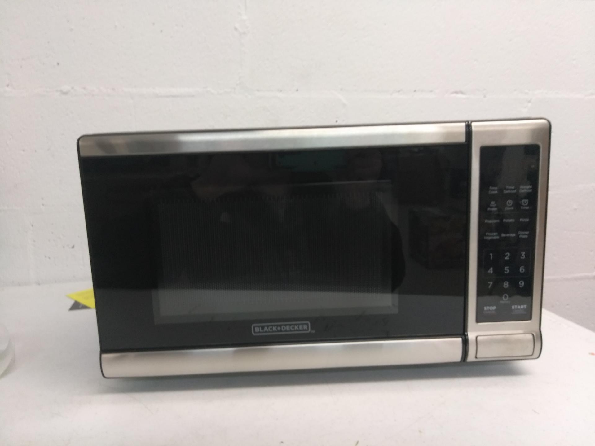 BLACK+DECKER EM720CB7 Digital Microwave Oven with PushButton Door, 0.7 Cu.ft eBay