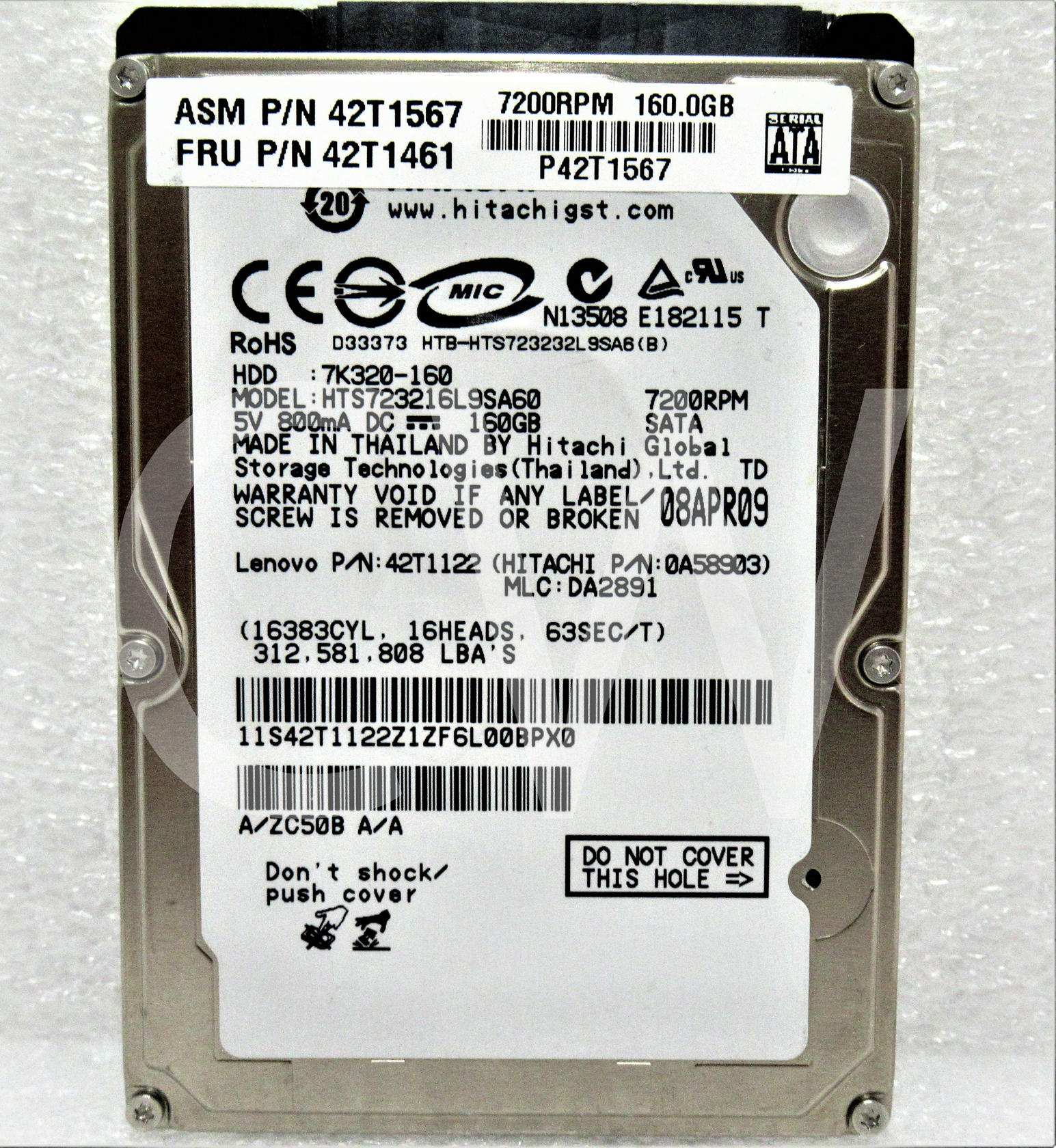 HTS723216L9SA60_-_top1.1b.jpg?