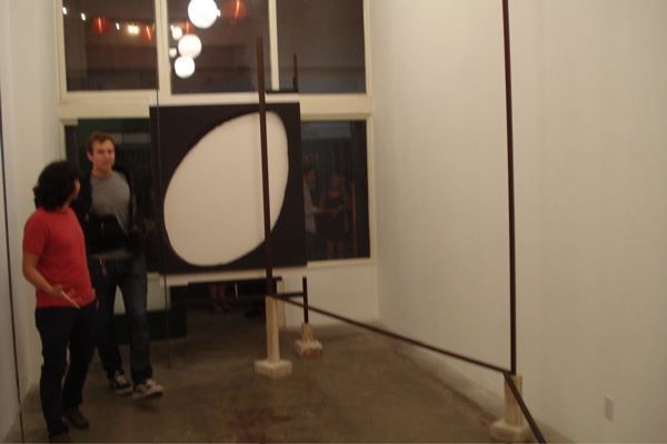 At the Muchael Rashkow opening. Those two guys will give you a sense of the work's scale.