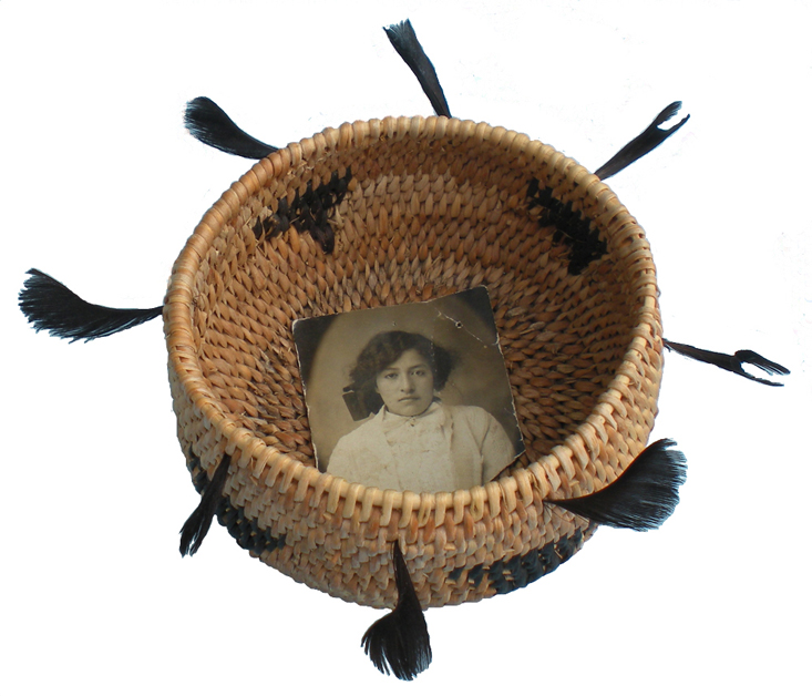 The artist’s first traditional basket, ornamented with quail topknot feathers and dedicated to her grandmother Beatrice Barcelone. Photo by Linda Yamane. The artist’s first traditional basket, ornamented with quail topknot feathers and dedicated to her grandmother Beatrice Barcelone. Photo by Linda Yamane.