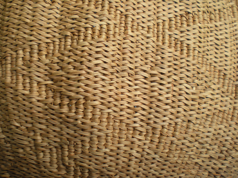 Utilitarian baskets were often made esthetically rich by subtle patterning, as in this seed-roasting basket created by the artist. Photo by Linda Yamane. Utilitarian baskets were often made esthetically rich by subtle patterning, as in this seed-roasting basket created by the artist. Photo by Linda Yamane.