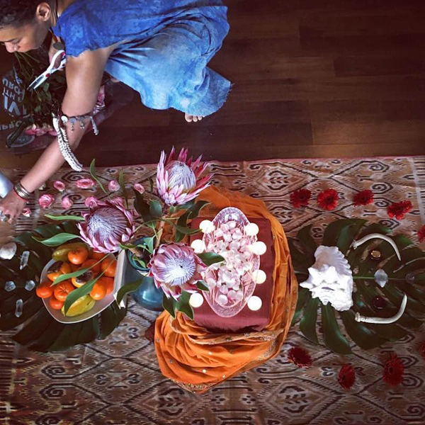Maryam Hasnaa At-Tauhidi building an altar.