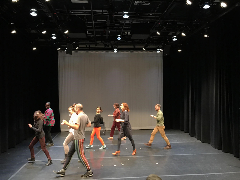 Keith Hennessy and members from the audience doing "The Hustle".