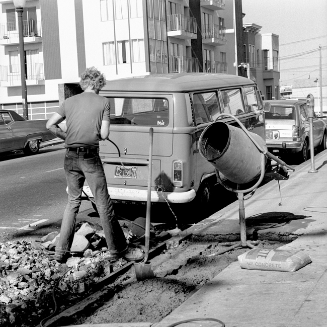 David Ireland repairing the sidewalk, 500 Capp Street, 1976; photo: Tom Marioni; image courtesy of The 500 Capp Street Foundation.