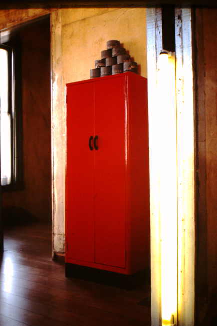 Red cabinet with cans, nd; photo: David Ireland; image courtesy of The 500 Capp Street Foundation.