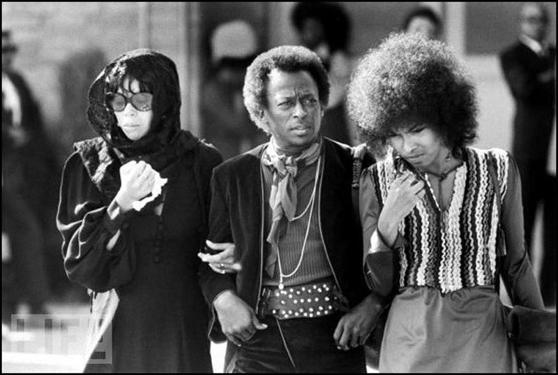 Betty Mabry, Miles Davis, and an unidentified woman attending the funeral of Jimi Hendrix. Photographer unknown.