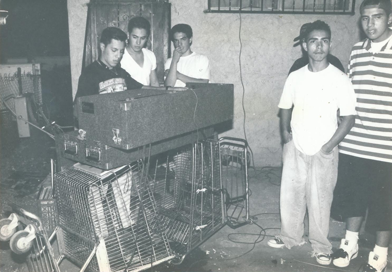 From a house party in East Los Angeles, 1993, hosted by party crew East LA Madness. Photographer unknown.