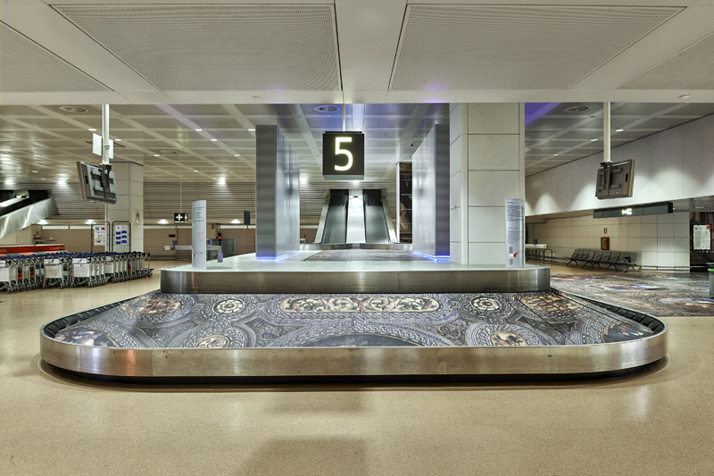Simon Denny, Secret Power, 2015. Installation view, Marco Polo Airport arrivals lounge. Photo: Paolo Monello.
