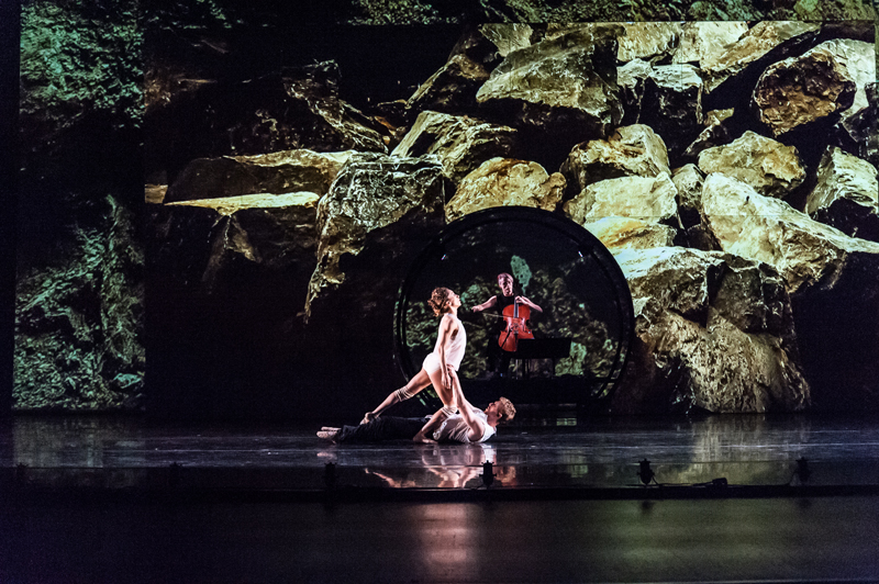 From ODC/Dance's production of <em>boulders and bones</em> at the Yerba Buena Center for the Arts, 2014. Pictured: Anne Zivolich and Dennis Adams (dancers); Zoë Keating (cellist). Photo: Marie-Pier Frigon.
